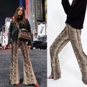 ZARA SNAKE PRINT FLARE PANTS .Size S